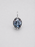 A 3D render of an oval-cut colour change sapphire pendant in a gold multi claw setting with a matching gold bail, shown on a neutral light grey background.