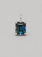 3D render of an emerald cut blue/green parti sapphire on a silver multi claw setting