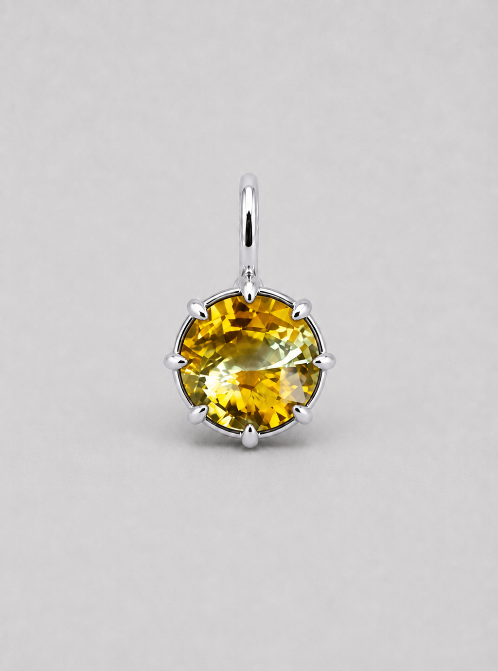 3D render of a multi claw pendant in silver with a thin bail with a round bi-coloured yellow sapphire