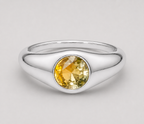 3D render of a signet style bezel set ring with a round bi-coloured yellow sapphire in sterling silver