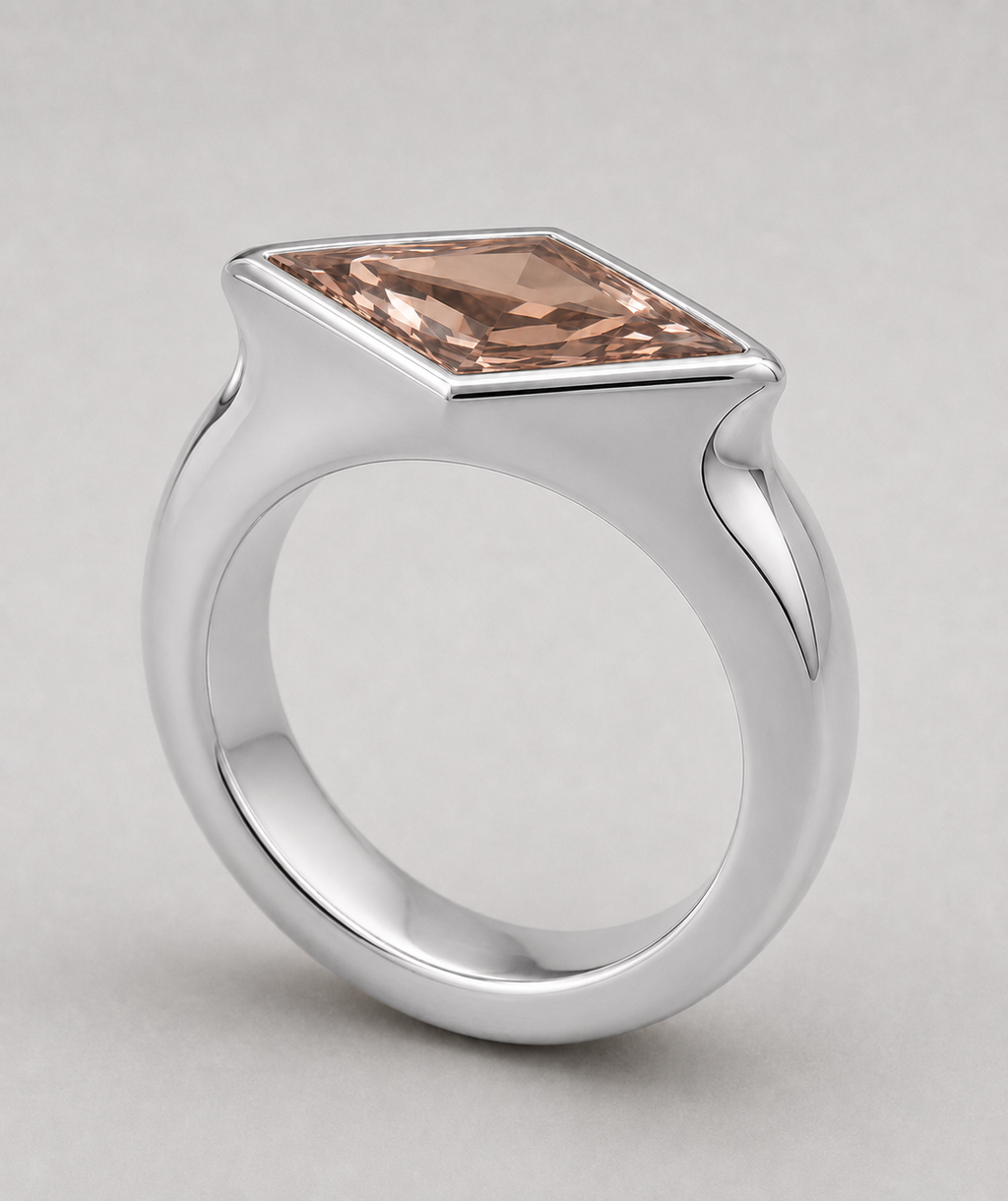 3D render of a lozenge dusty pink zircon in a sterling silver signet style ring