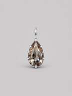 3D render of a pear shaped champagne coloured natural zircon in a sterling silver multi claw pendant setting