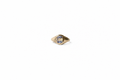 A yellow gold signet ring with a cushion-cut parti sapphire, on a plain white background.