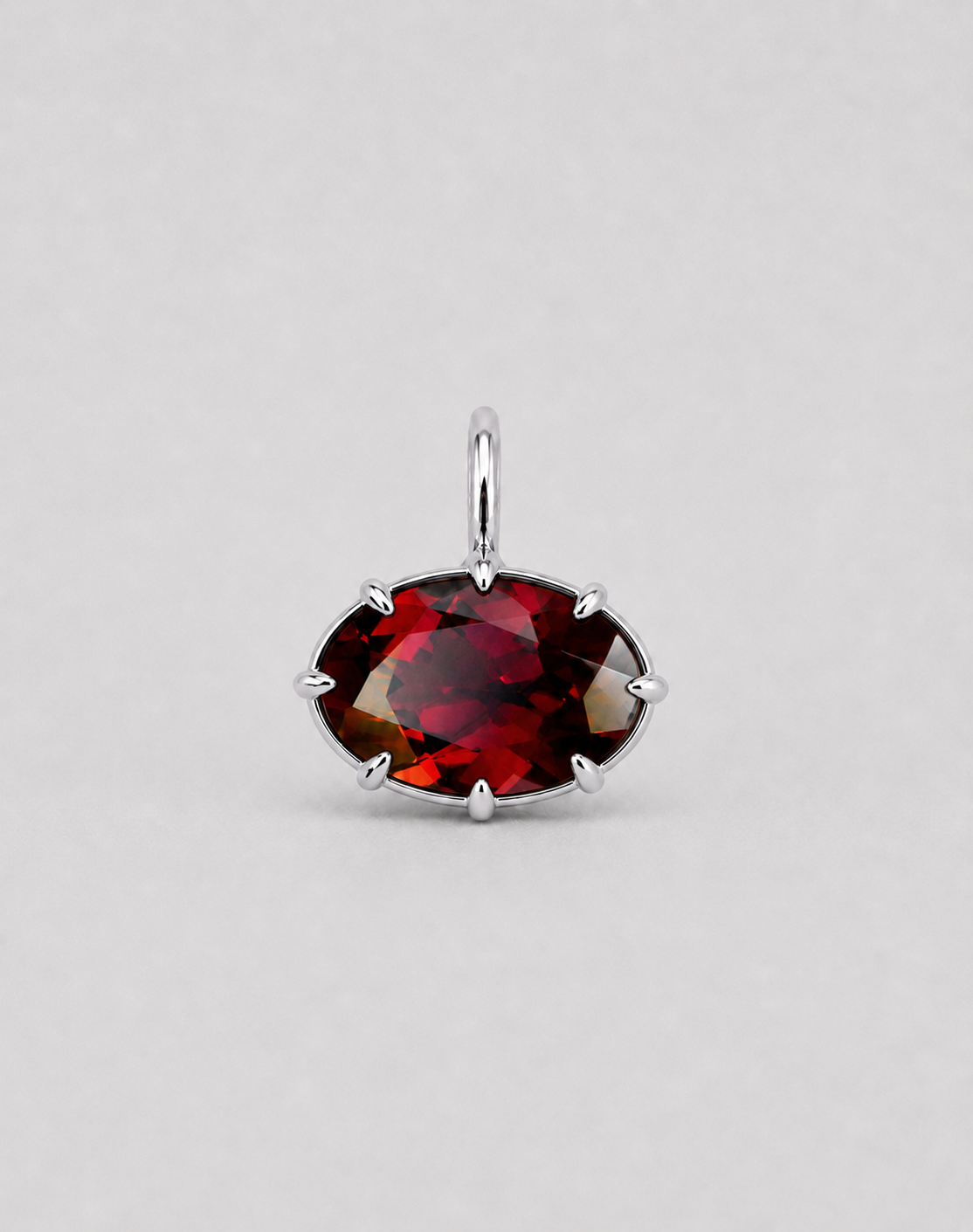 3D render of a deep red almandine garnet set in a multi claw style pendant in sterling silver 