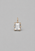 3D render of emerald-cut milky white sapphire pendant in a gold  in a multi claw setting on a solid grey background.