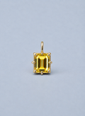 3D render of an emerald cut yellow Australian sapphire in a gold multi claw pendant setting 