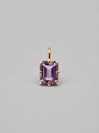 3D render of a gold  multi claw pendant featuring an emerald cut purple spinel 