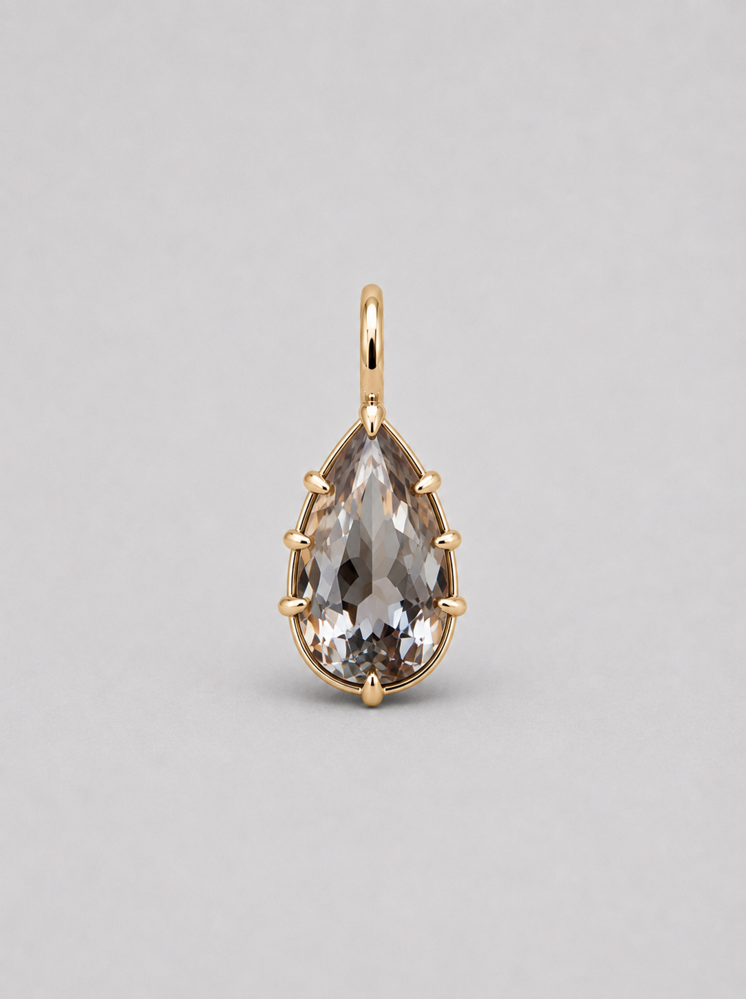 3D render of a pear shaped champagne coloured natural zircon in a yellow gold multi claw pendant setting