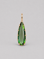 3d render of an elongated pear shape dark green tourmaline set in a yellow gold multi claw pendant