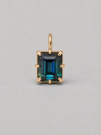 3D render of an emerald cut blue/green parti sapphire on a gold multi claw setting