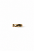 A gold band ring engraved with the gothic-style text 'Finity Ring' on a plain white background.