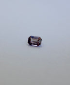 A loose purple emerald cut Spinel