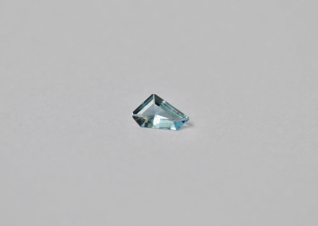 A loose freeform light blue aquamarine
