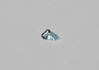 A loose freeform light blue aquamarine